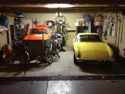 Plus 2 and Elan in garage.jpg and 